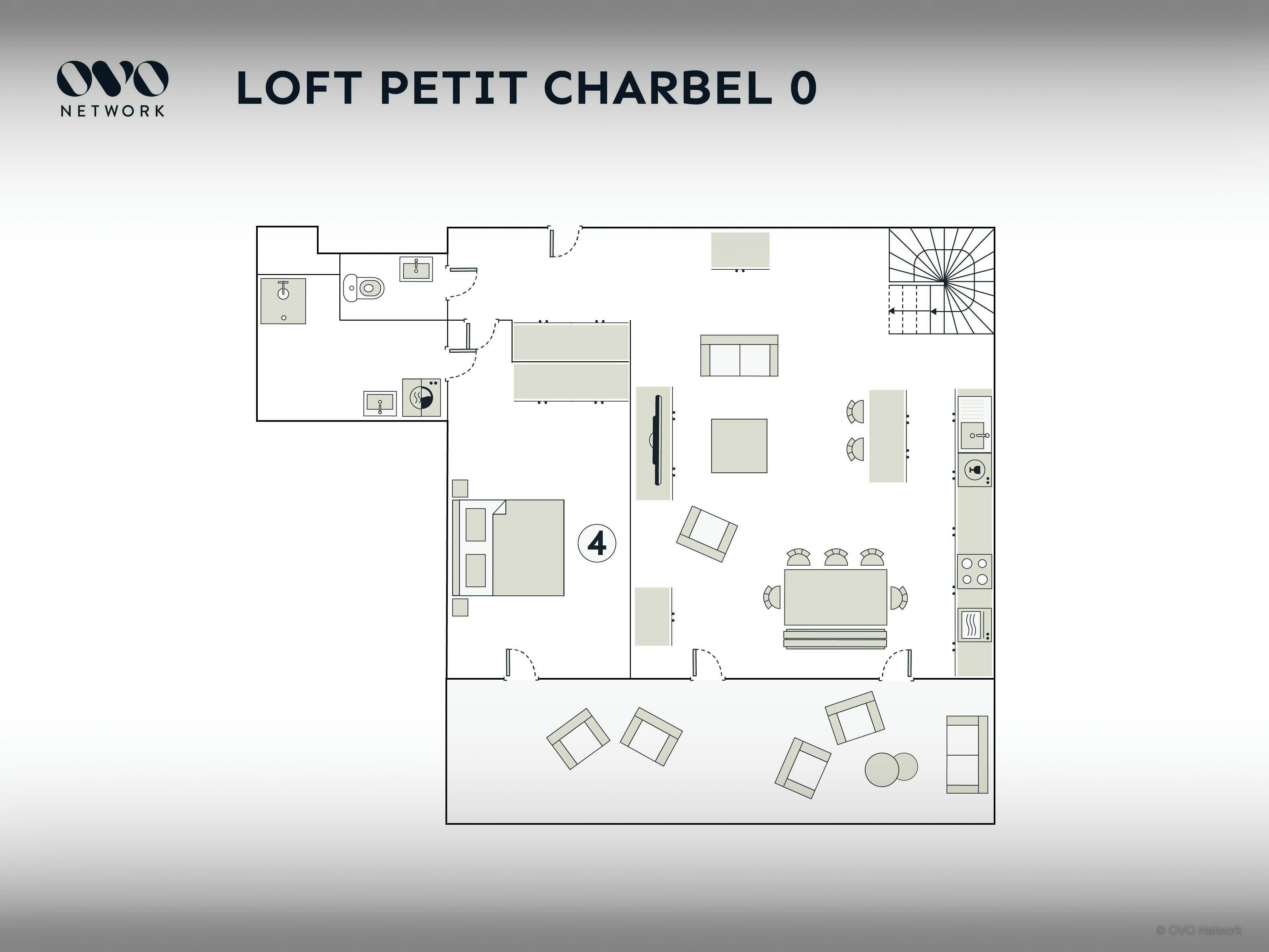 A floor plan of a loft apartment with a kitchenette, a dining area, a living room, and a small bathroom.