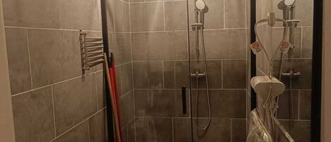 Shower, hair dryer, towels, soap