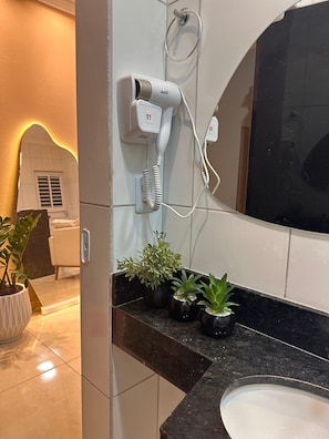 Hair dryer, towels, soap, toilet paper