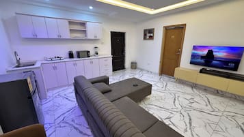 Luxe appartement, balkon, uitzicht op de stad | Woonruimte