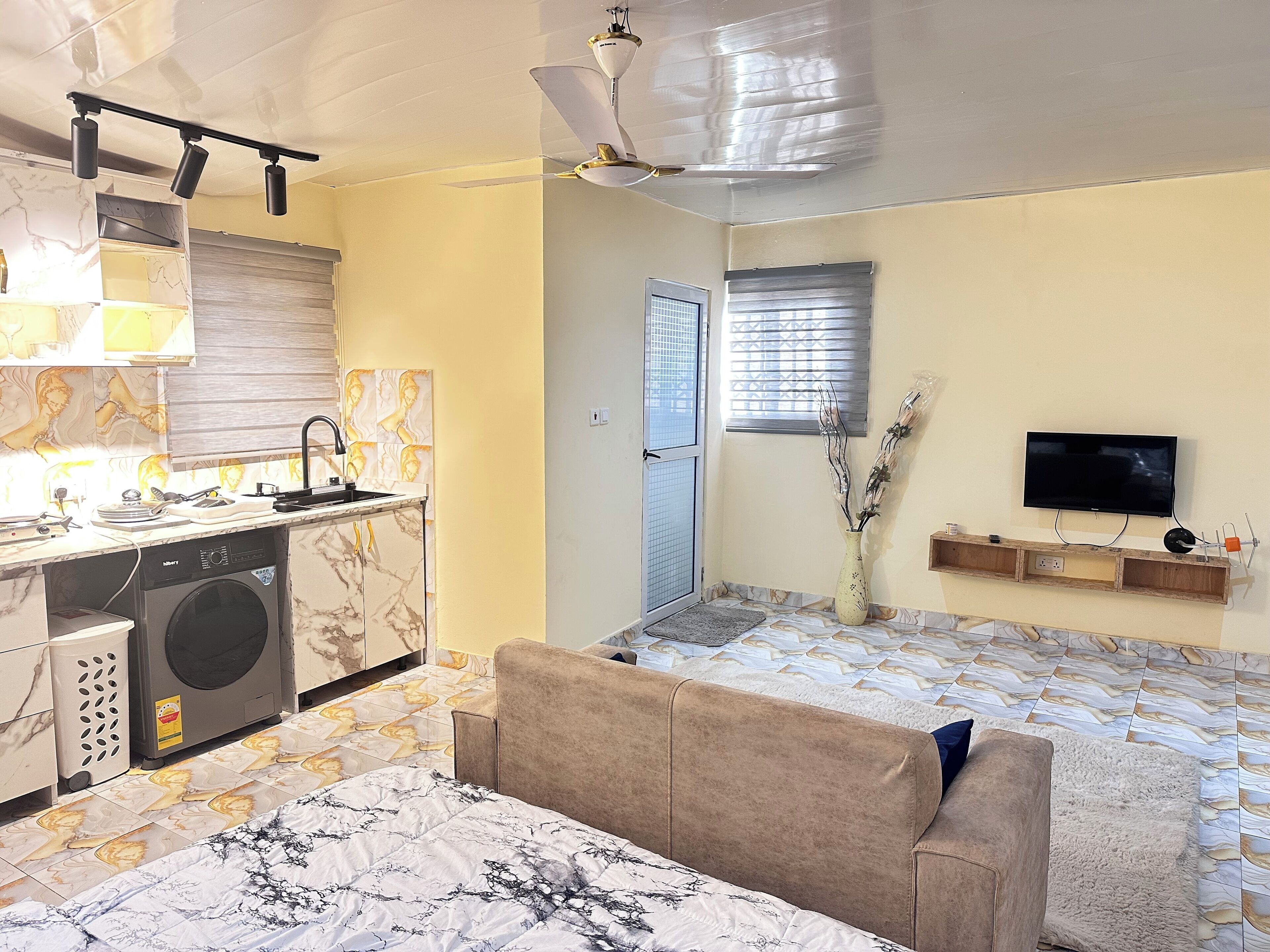 Luxury Apartment, Balcony, City View | Desk, laptop workspace, iron/ironing board, WiFi