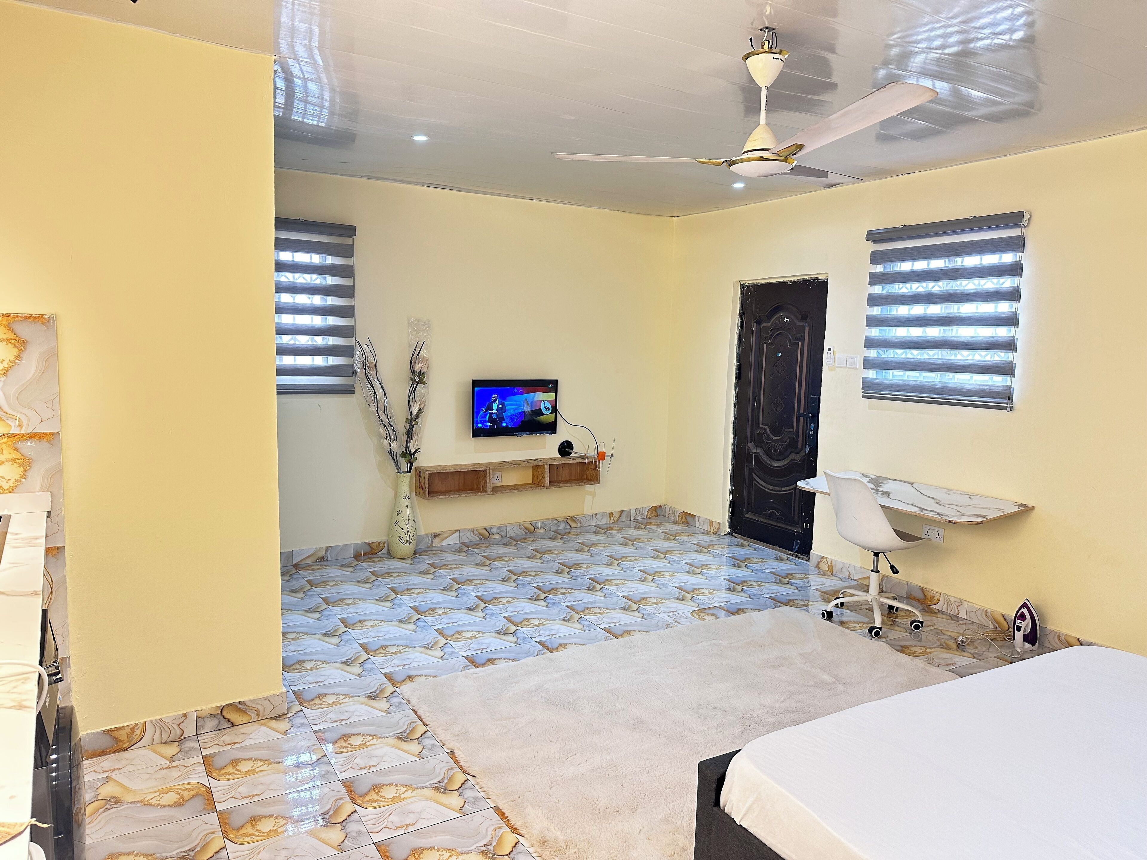 Luxury Apartment, Balcony, City View | Desk, laptop workspace, iron/ironing board