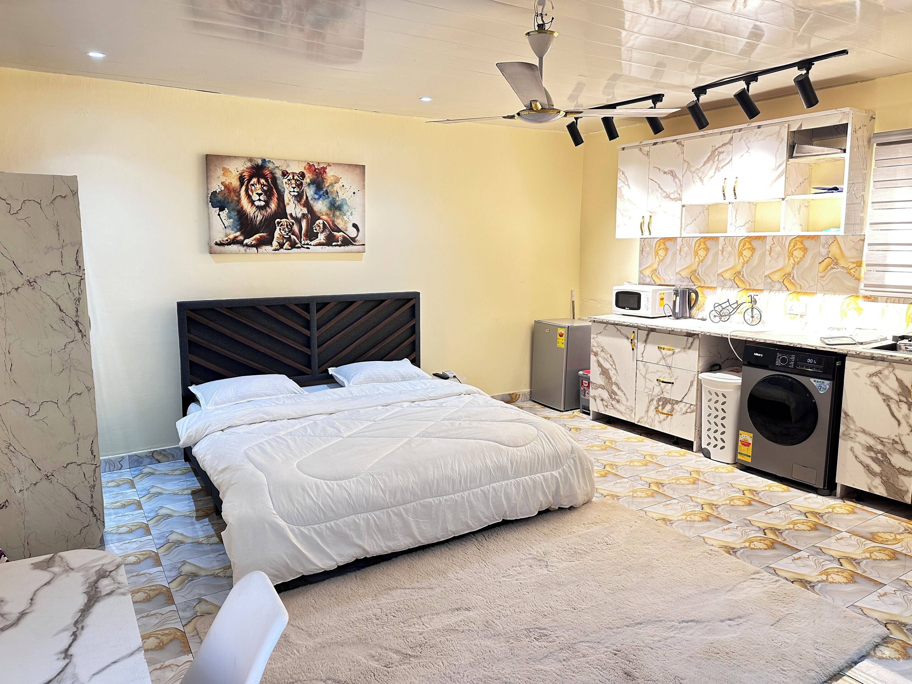 Luxury Apartment, Balcony, City View | Desk, laptop workspace, iron/ironing board