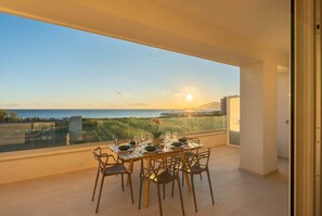 A private sea-view terrace where mornings start slowly and sunsets become unforgettable.