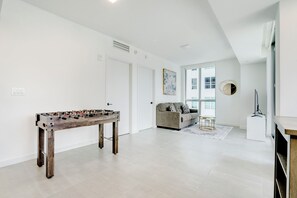 Deluxe Condo, Balcony, City View | Living area