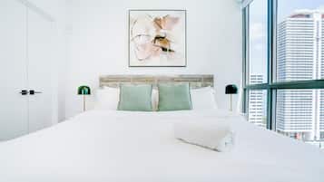 Deluxe Condo, Balcony, City View | In-room safe, desk, laptop workspace, blackout drapes