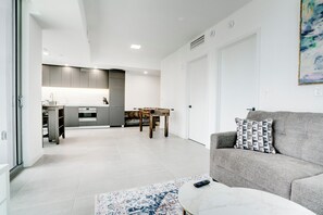 Deluxe Condo, Balcony, City View | Living area