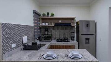 Fridge, microwave, cookware/dishes/utensils