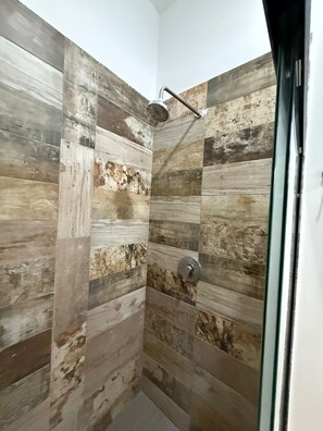 Shower, towels, toilet paper