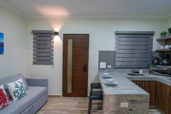 Fridge, microwave, cookware/dishes/utensils