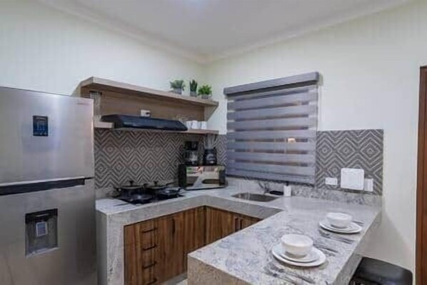 Fridge, microwave, cookware/dishes/utensils