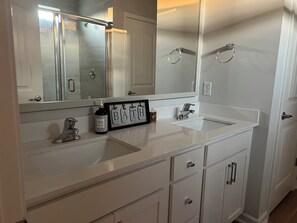 Hair dryer, towels, soap, toilet paper