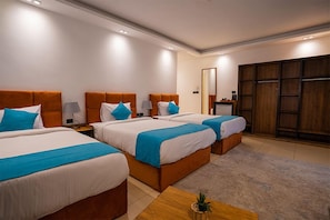 Deluxe Triple Room, City View | In-room safe, iron/ironing board, free WiFi