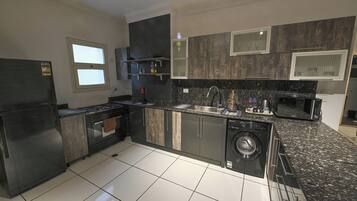 Luxury Apartment, Balcony, City View | In-room safe, iron/ironing board, free WiFi