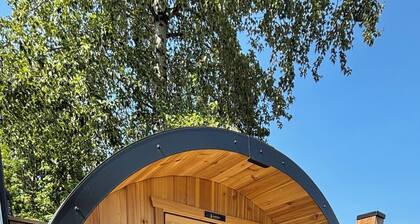 Modern 2BR Suite with Sauna, Cold Pl, Private Yard, & EV – Pet Friendly