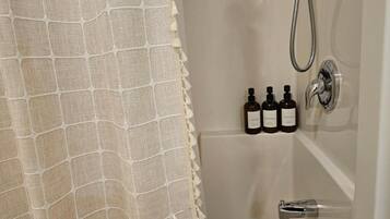 Hair dryer, towels, soap, shampoo