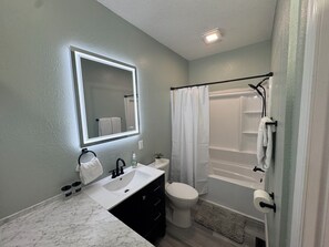 Hair dryer, towels, soap, shampoo