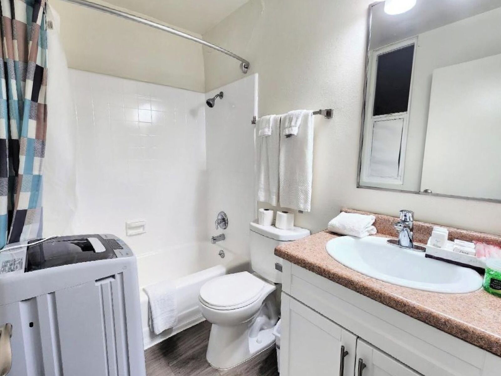 Hair dryer, towels, soap, shampoo