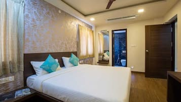 Deluxe Double Room, City View | In-room safe, desk, laptop workspace, blackout curtains