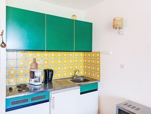 Fridge, microwave, cookware/dishes/utensils