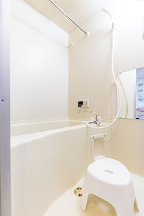 Hair dryer, bidet, towels, soap
