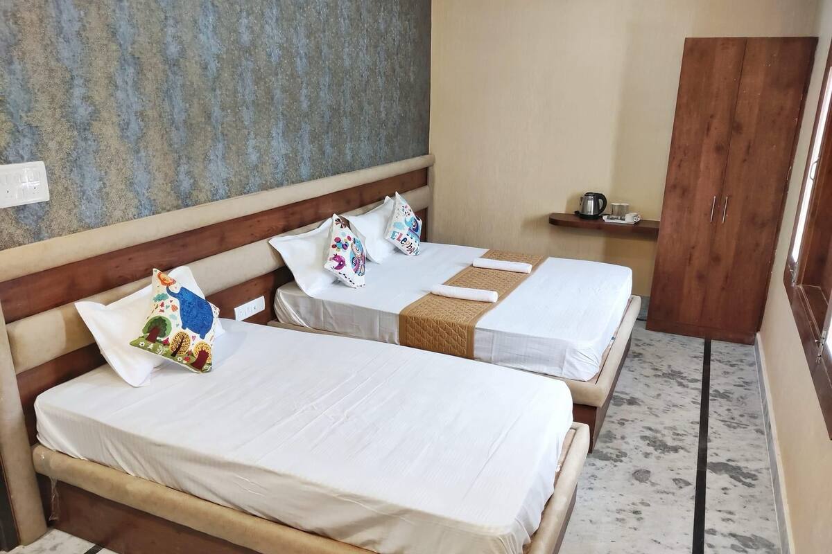 Family Triple Room, City View | Desk, laptop workspace, free WiFi