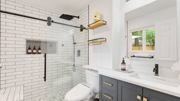 Shower, hair dryer, towels