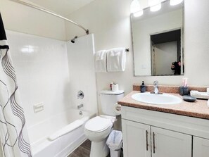 Hair dryer, towels, soap, shampoo