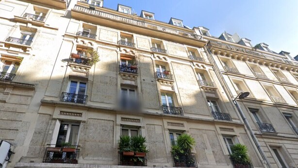 A multi-story building with balconies, large windows, and a blue door. - 2Bedrooms#6pers#Poissoniers#Paris 18#AC (Paris)