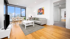 Living area - Modern Luxe Charm with Balcony Parking Gym (Ivanhoe)