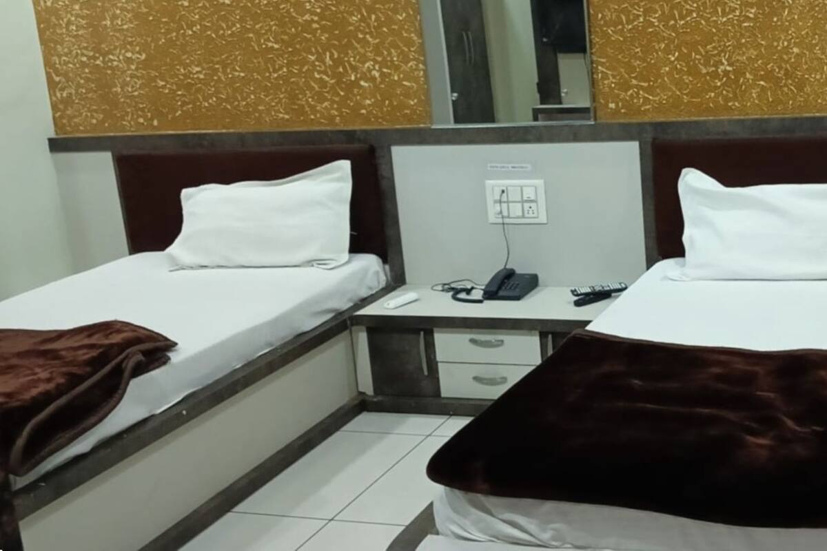 Kamar Superior, AC | Meja kerja, tempat tidur lipat/tambahan, Wi-Fi gratis, dan seprai linen