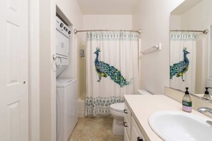 Shower, hair dryer, towels, shampoo