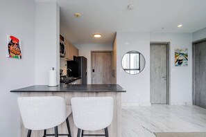 Fridge, microwave, coffee/tea maker, toaster