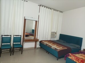 Suíte estúdio família, vista para a cidade | Camas extras/dobráveis (sobretaxa), Wi-Fi de cortesia, roupa de cama
