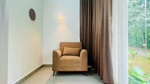 Deluxe Suite, Garden View | Living area | Printers