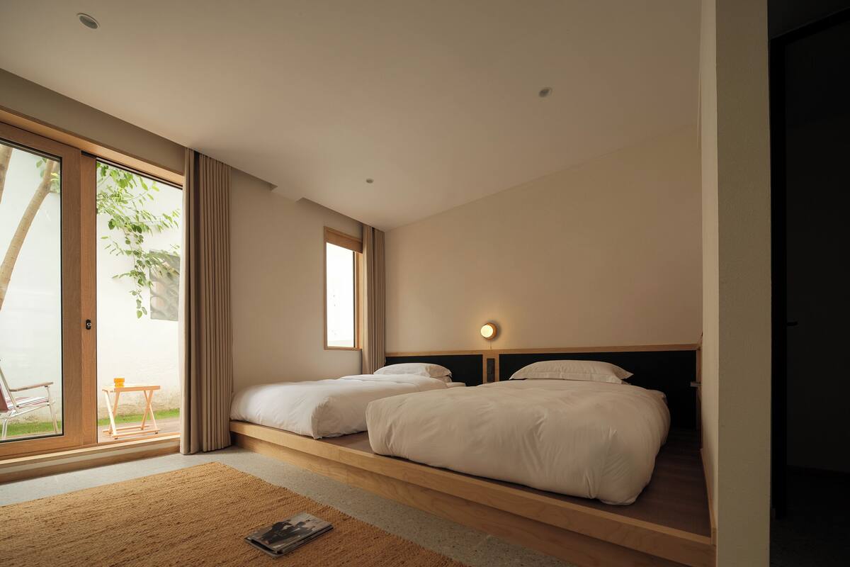 Blackout curtains, soundproofing, iron/ironing board (on request)