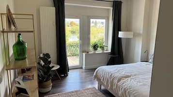 1 habitación, tabla de planchar con plancha, wifi gratis y ropa de cama