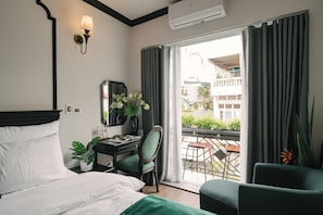 Habitación de lujo, vista a la ciudad | Ropa de cama de alta calidad y minibar 