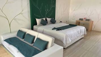 Habitación Deluxe | Escritorio, wifi gratis y ropa de cama