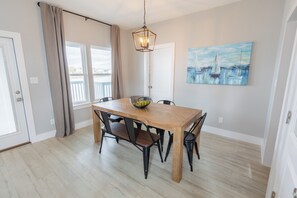 Dining - Escape to this serene 3-bedroom bayfront retreat in Seabrook Shores. Featuring stunning water views, a spacious deck for sunsets, and cozy coastal interiors, this hideaway is perfect for family getaways or a peaceful escape by the bay (Seabrook)