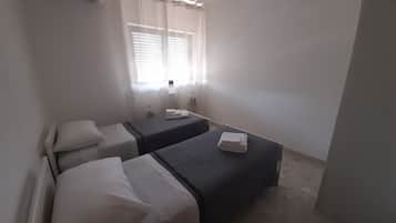 2 habitaciones, tabla de planchar con plancha y wifi gratis