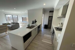 Fridge, microwave, oven, stovetop - Charming Modern Family Home in Wyndham Vale (Wyndham Vale)