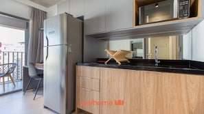 Microwave, stovetop, coffee/tea maker, cookware/dishes/utensils