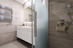Shower, towels, toilet paper