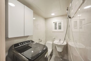 Shower, hair dryer, towels, soap