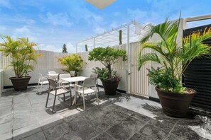 Outdoor dining - Modern 2BR Condo at The Building Loft - Pool (Playa del Carmen)