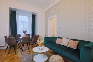 Superior Apartment | Living area | 125-cm Smart TV with satellite channels