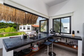 Fridge, microwave, stovetop, coffee/tea maker