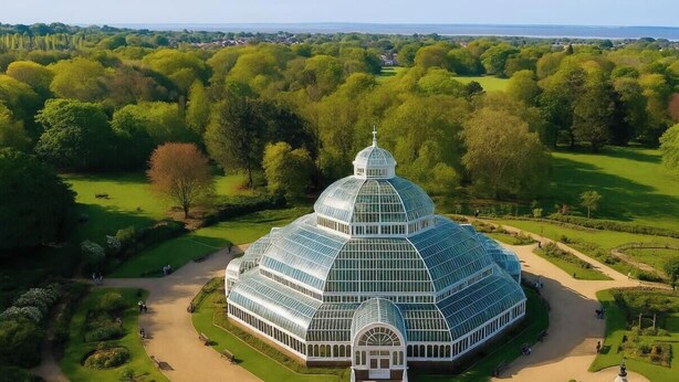 A large greenhouse structure with a dome roof, surrounded by well-maintained gardens and pathways. - City Centre Apt–Sleeps 6, Parking, Shops & Trains (Merseyside)