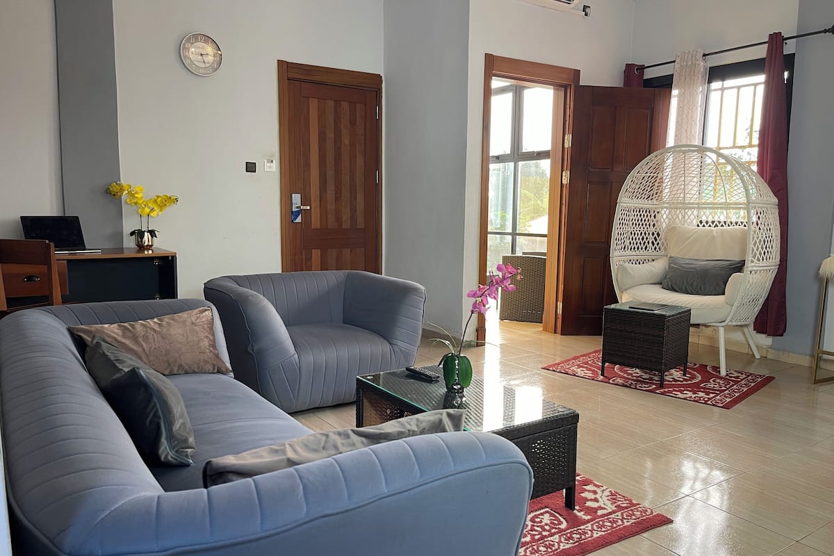 Senior Suite, City View | Living area | 80-inch Smart TV with satellite channels, MP3 dock